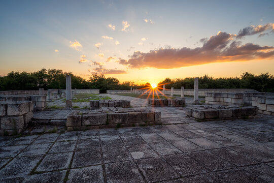 Colorful sunset above the ruins of the Great Basilica, which is the largest Christian cathedral in medieval Europe near Pliska - capital city of the First Bulgarian Empire, Bulgaria..