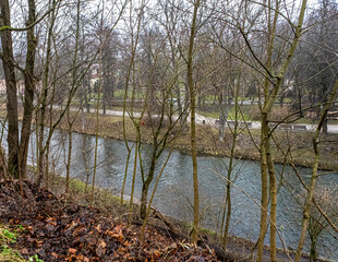 View of Vilnia river in a cloudy and foggy winter day as seen from Uzupis  neighborhood in Old Town Vilnius, Vilnius, Lithuania 