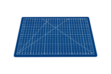 A small blue cutting mat with a white grid is isolated.