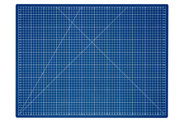 A big blue cutting mat with a white grid is isolated.