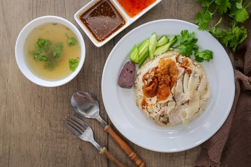 Mixed Chicken and rice ,boied chicken with fried chicken and rice,coriander and cucumber with sauce and soup , hainanese chicken rice, thai called khao man gai, 