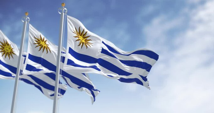 Uruguay national flags fluttering in the wind on a sunny day