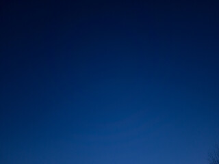 Clear blue sky background with gradient from lighten down to darken up.