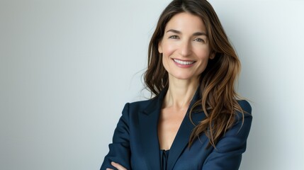 Fototapeta premium Portrait of a successful confident female business woman isolated against a white background