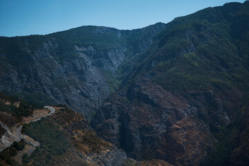 a view of the mountain road, city and mountains from the funicular near Tatev Monastery