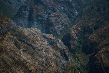 a view of the mountain road, city and mountains from the funicular near Tatev Monastery