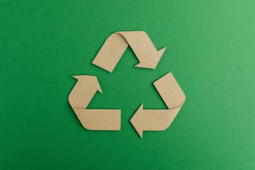 Cardboard recycling symbol on green background showcases eco-friendliness. Generative AI