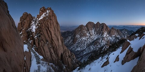 Majestic Winter Mountain Landscape at Dusk Snow Covered Peaks and Stone Steps