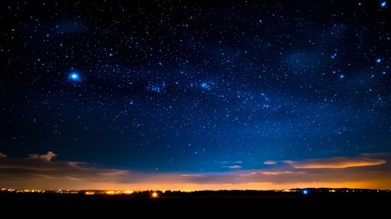 Fototapeta premium Starry Night Sky Over Landscape with Twinkling Stars and Clouds