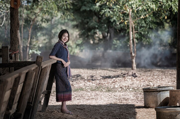 Fototapeta premium Portrait Asian woman in the countryside of Thailand