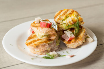 Crispy sandwiches with cheese and herbs