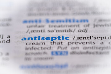 Antiseptic word in a dictionary. Selective focus, close up.