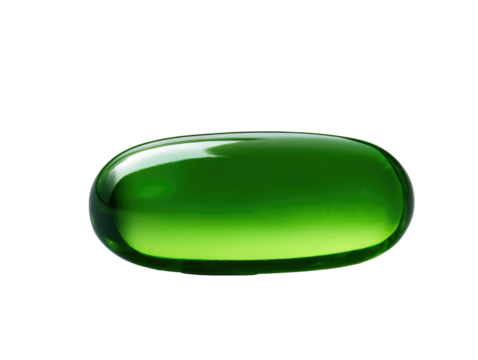 green pills on white background