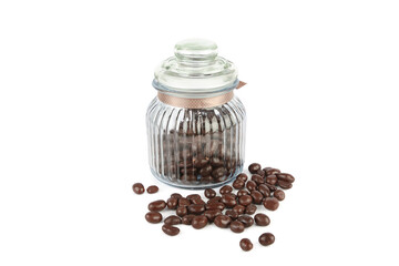 Chocolate dragees in a glass jar isolated on white.