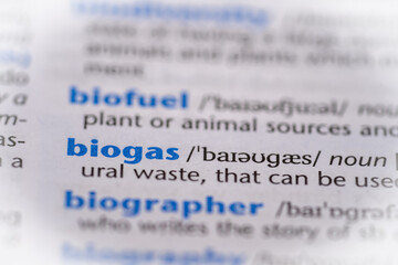 Biogas word in a dictionary. Selective focus, close up.