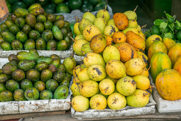 Fruits and vegetables at a local market in Sri lanka. Tropical or exotic fruits on the street in Asia.
