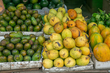 Fruits and vegetables at a local market in Sri lanka. Tropical or exotic fruits on the street in Asia.