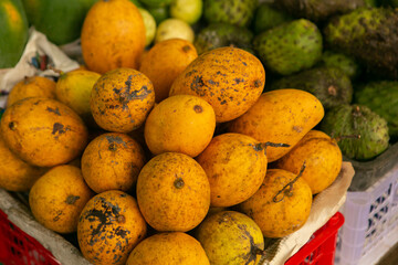 Fruits and vegetables at a local market in Sri lanka. Tropical or exotic fruits on the street in Asia.
