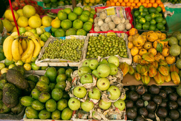 Fruits and vegetables at a local market in Sri lanka. Tropical or exotic fruits on the street in Asia.