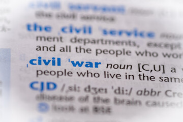 Civil war word in a dictionary. Selective focus, close up.