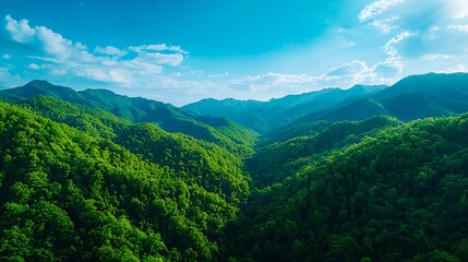 Fototapeta premium Lush Green Mountains Under Bright Blue Sky with Fluffy Clouds