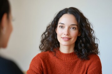 Fototapeta premium Modern Corporate Inclusivity Latina HR Manager Interviews with Focus on Disability and Diversity - Vibrant Business Space Elevating Equal Opportunity Practices
