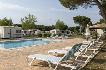Obraz premium Caravan park with swimming pool and sun loungers, relaxation, swimming pools