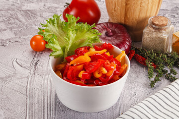 Diced raw bell red and yellow pepper