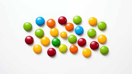 Obraz premium Colorful Candy-Coated Chocolate Pieces Spread Across a White Background, Creating a Playful and Inviting Display Perfect for Any Sweet Treat Lover