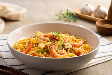 Spaghetti with shrimp and olive oil with garlic sauce.Shrimp Aglio E Olio pasta in a plate.easy and quick dish.