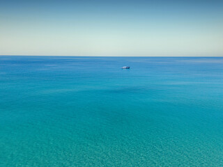 Fototapeta premium An Stunning beautiful sea landscape beach with turquoise water with copy space for your text. Beautiful turquoise water. ach with turquoise water. Beautiful tropical beach with blue sky.