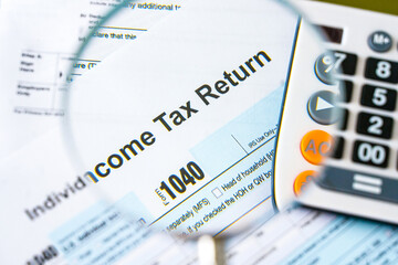 Close up of United States federal income tax return IRS 1040 documents