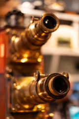 Closeup of dual lenses on vintage projector