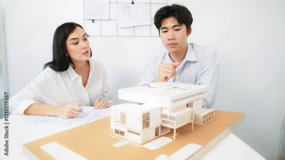 Aufkleber closeup of skilled architecture engineer team measure and decide house model while working together 