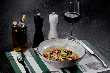 Creamy Tortellini Pasta with Fresh Basil and Tomatoes.