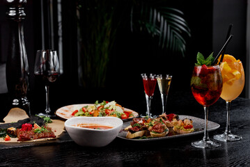 Luxurious Dinner Setting with Cocktails and Appetizers.