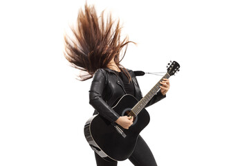 Woman playing a guitar and waving hair
