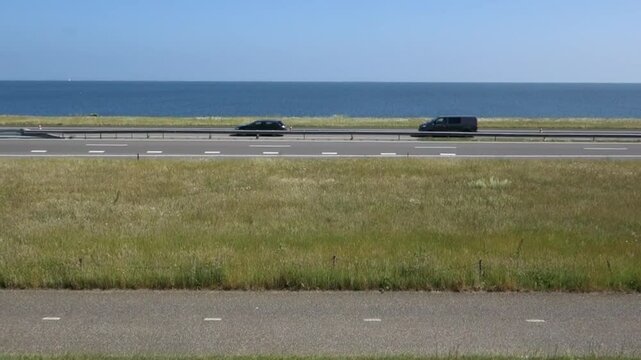 Afsluitdijk The Netherlands A7 motorway along the Afsluitdijk, separating Ijsselmeer and the Waddenzee.