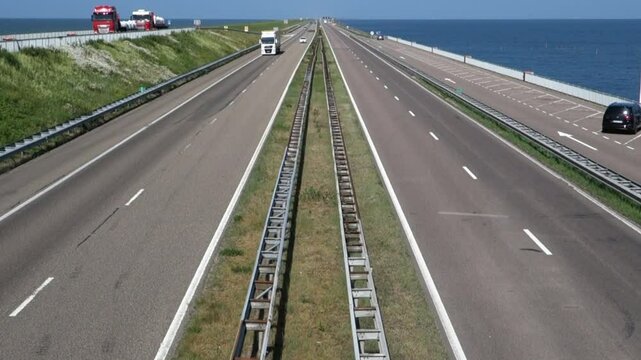 Afsluitdijk The Netherlands A7 motorway along the Afsluitdijk, separating Ijsselmeer and the Waddenzee.
