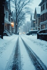 a snowy street with houses and trees