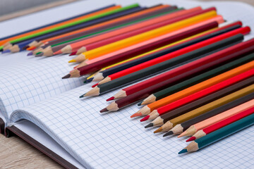 Colored pencils and a notebook