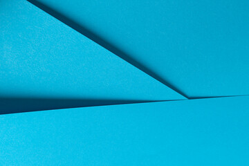 Blue paper background with a smooth matte finish and a subtle gradient. Bright pastel tones and...