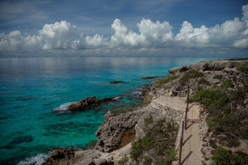 Fototapeta premium Rocky Caribbean Sea coastline with rocks and azure water.