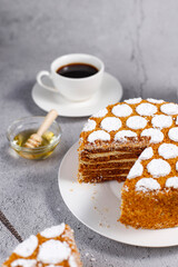 Traditional layered honey cake slices.