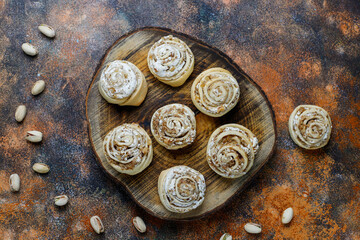 Delicious homemade meringue roll round cookies with nuts.