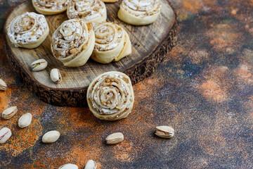 Delicious homemade meringue roll round cookies with nuts.