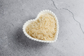 Homemade uncooked kataifi or kadaifi dough.