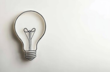 One-line drawing of an idea light bulb in the shape of a man's head