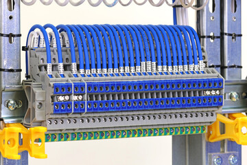 Marking of electrical wires using thermal printing on vinyl tape.