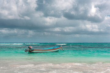 The boat in the Caribbean Sea on a sunny day.